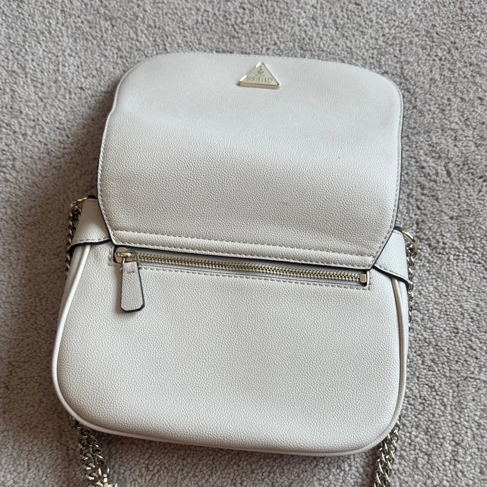GUESS Cream Pebbled Leather Crossbody with Gold Triangle Logo